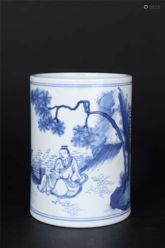 A BLUE AND WHITE FIGURAL BRUSH POT
