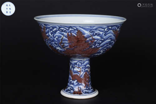 AN UNDERGLAZE-BLUE AND COPPER-RED GLAZE DRAGON AND WAVER STE...