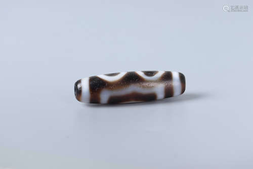 A PIECE OF DZI BEAD