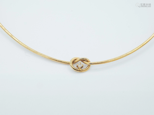An 18k. yellow gold necklace with a 0,05 ct. brilliant