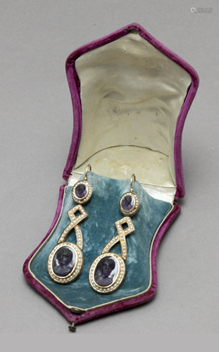 A late 19th century long earrings