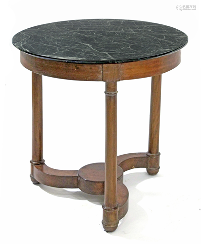 A French Empire style walnut guÃ©ridon table with a