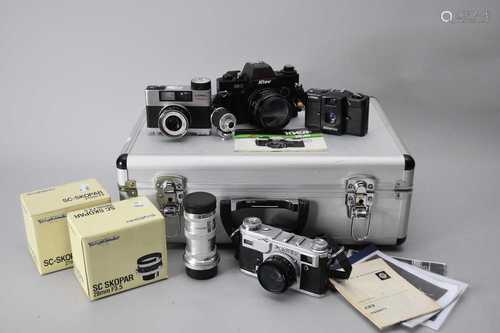 A group of Soviet cameras and associated lenses