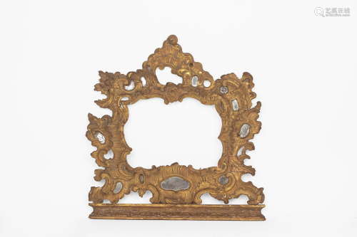 An 18th century Louis XVI period frame in carved and