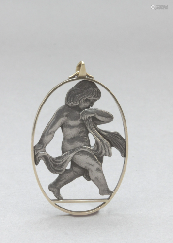 A 20th century silver and gold pendant