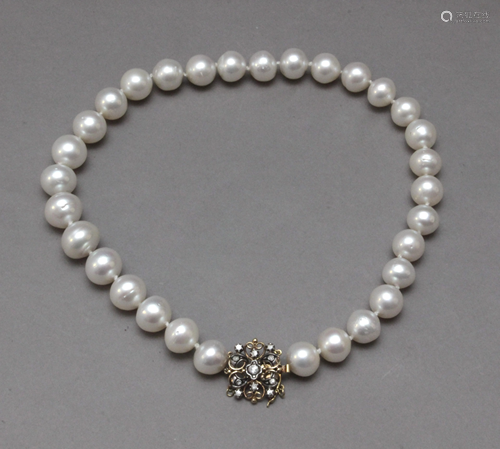 An Australian pearls necklace with rose cut diamonds