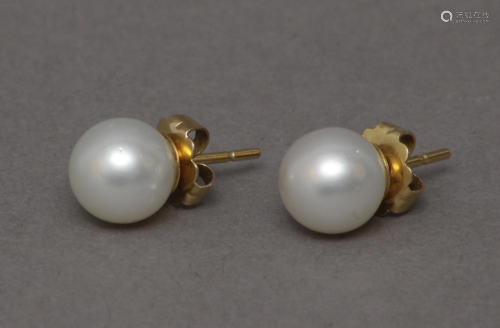 A pair of Australian pearl stud earrings with 18k.