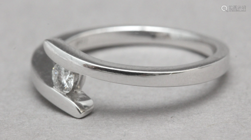 A 0,15 ct. brilliant cut diamond solitaire ring