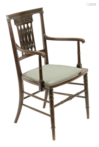 A 20th century Regency style walnut armchair