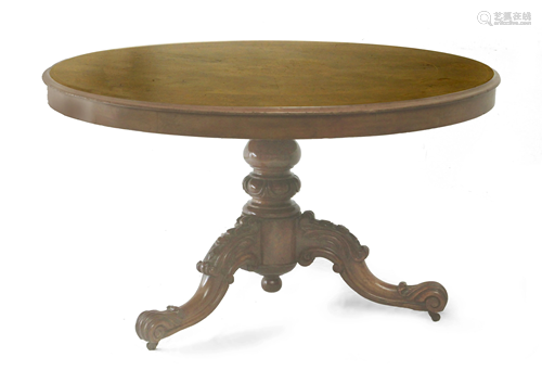 A 19th century English walnut folding table