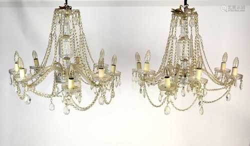 A pair of large cut glass eight-light chandeliers