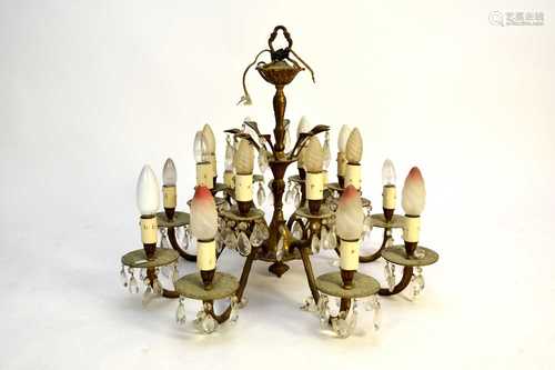 A gilt metal sixteen-light chandelier