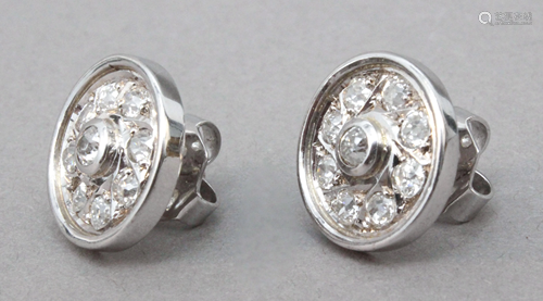 A pair of old mine and old European cut diamonds