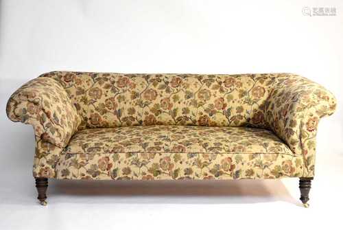 A late Victorian drop-end Chesterfield sofa