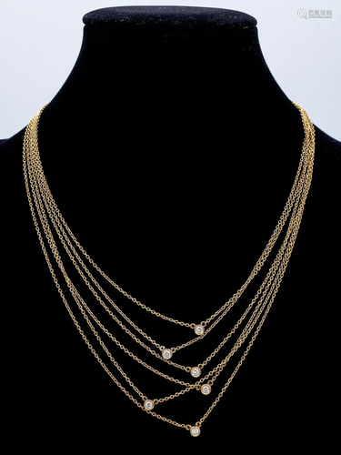 A six strand 18k. yellow gold and diamonds necklace