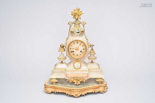 A French alabaster and gilt metal mantel clock