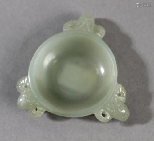 A 19th century Chinese urn in celadon jade