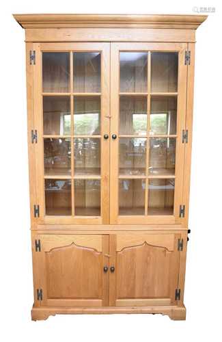 A large light oak display cabinet by Venables Brothers, Ches...