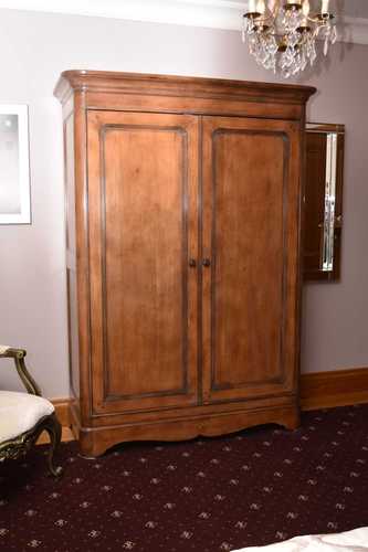 A reproduction walnut double wardrobe