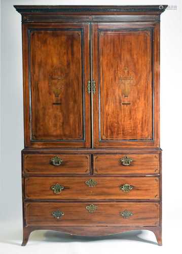 A George III inlaid mahogany linen press