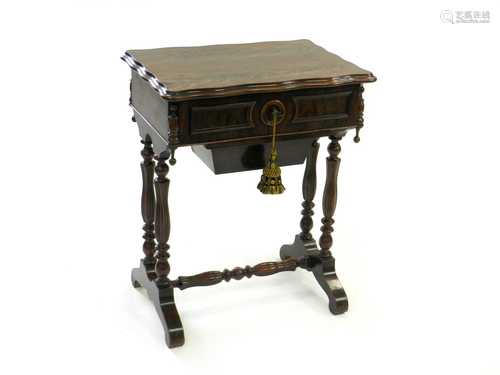 A Victorian mahogany work table