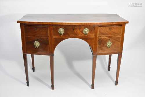 A George III mahogany bow-front sideboard