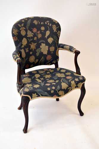 A George III upholstered mahogany salon armchair