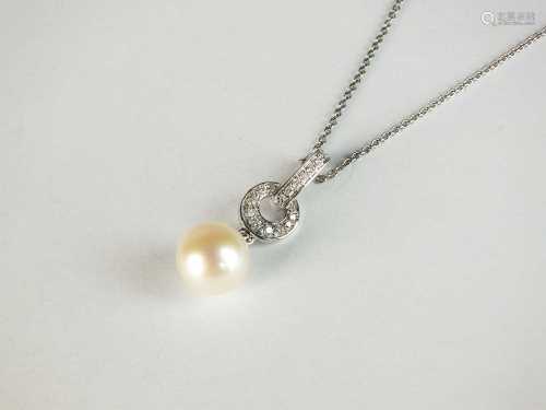 A 9ct white gold cultured pearl and diamond pendant