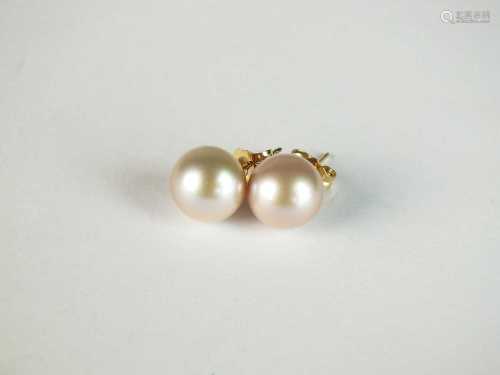 A pair of 9ct yellow gold pink freshwater pearl studs