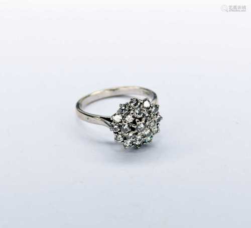 An 18ct white gold diamond cluster ring