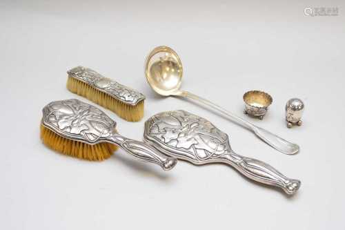An Edwardian three silver silver mounted dressing table set
