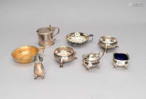A collection of silver cruets