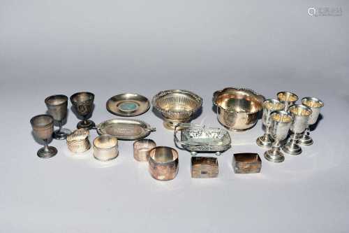 A small collection of silver and plate