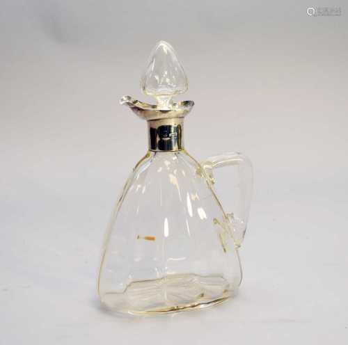 An Edwardian silver mounted decanter
