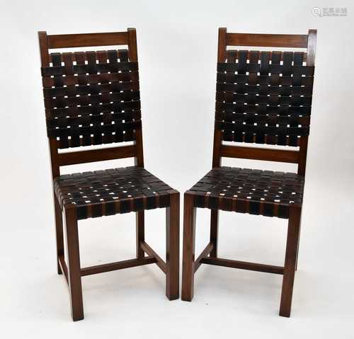 A set of eight modern hardwood and leather dining chairs