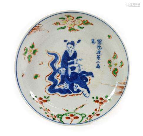 A Chinese Porcelain Saucer Dish, 17th century, painted in un...