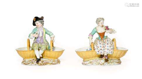 A Pair of Meissen Porcelain Figural Sweetmeat Dishes, late 1...