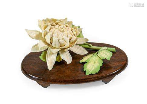 A Japanese Ivory Flower Okimono, Meiji/Taisho period, in the...