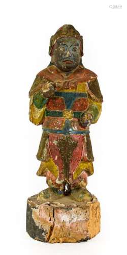A Chinese Carved and Polychrome Wooden Figure of a Temple Gu...