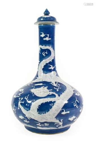 A Chinese Porcelain Bottle Vase and Cover, 19th century, pai...