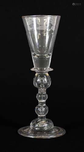 A Wine Glass, circa 1720, the conical bowl with solid base a...