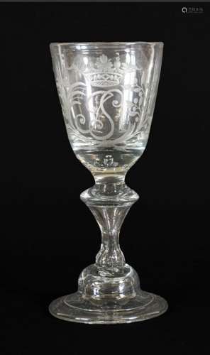 A Wine Glass, circa 1730, the rounded funnel bowl engraved w...
