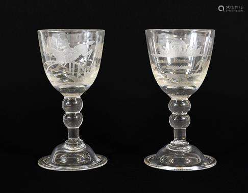 A Pair of Wine Glasses, circa 1740, the rounded funnel bowls...
