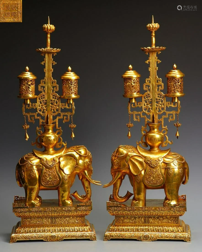 QIANLONG MARK GILT BRONZE ELEPHANT CANDLE HOLDE…