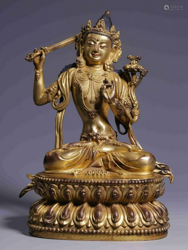 GILT BRONZE CAST MANJUSRI STATUE