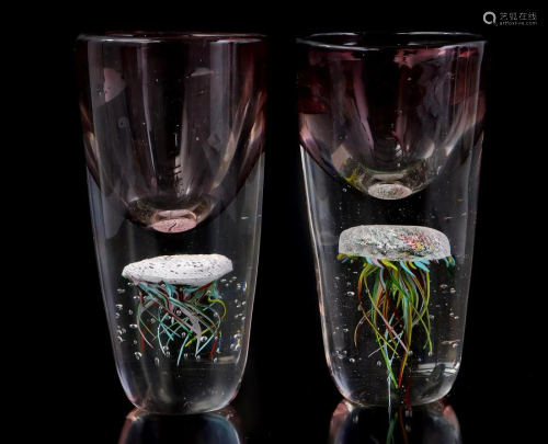 2 colored glass decorative vases