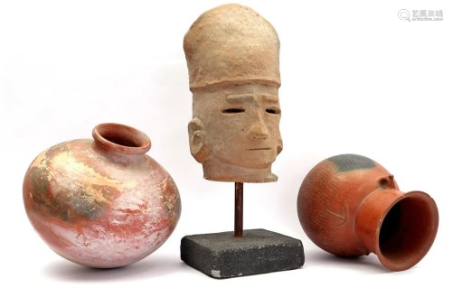 Terracotta head on stand