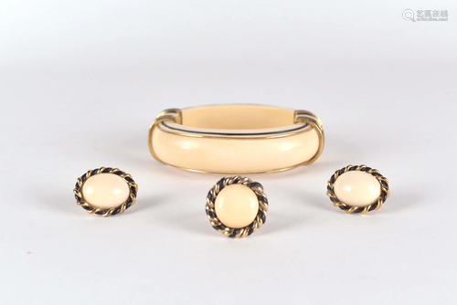 Bone and 14 kt gold bracelet, earings and ring,