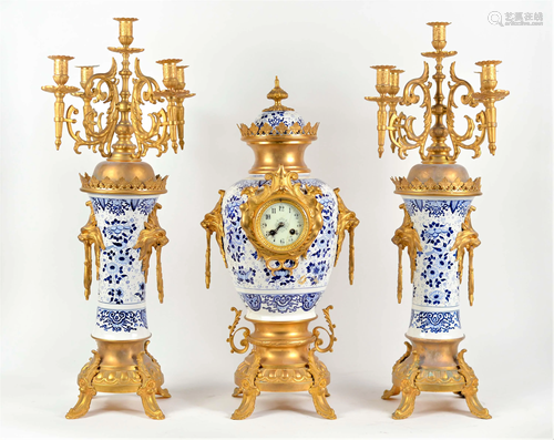 Porcelain and bronze clock and candlesticks set