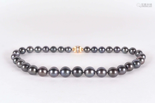 Tahiti large black pearls necklace, replacement value $